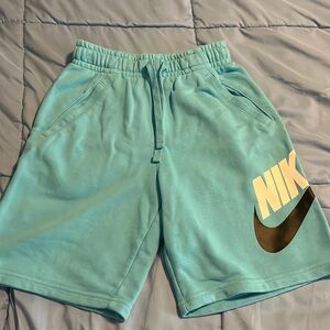 Nike light blue youth large sweat shorts with pockets
